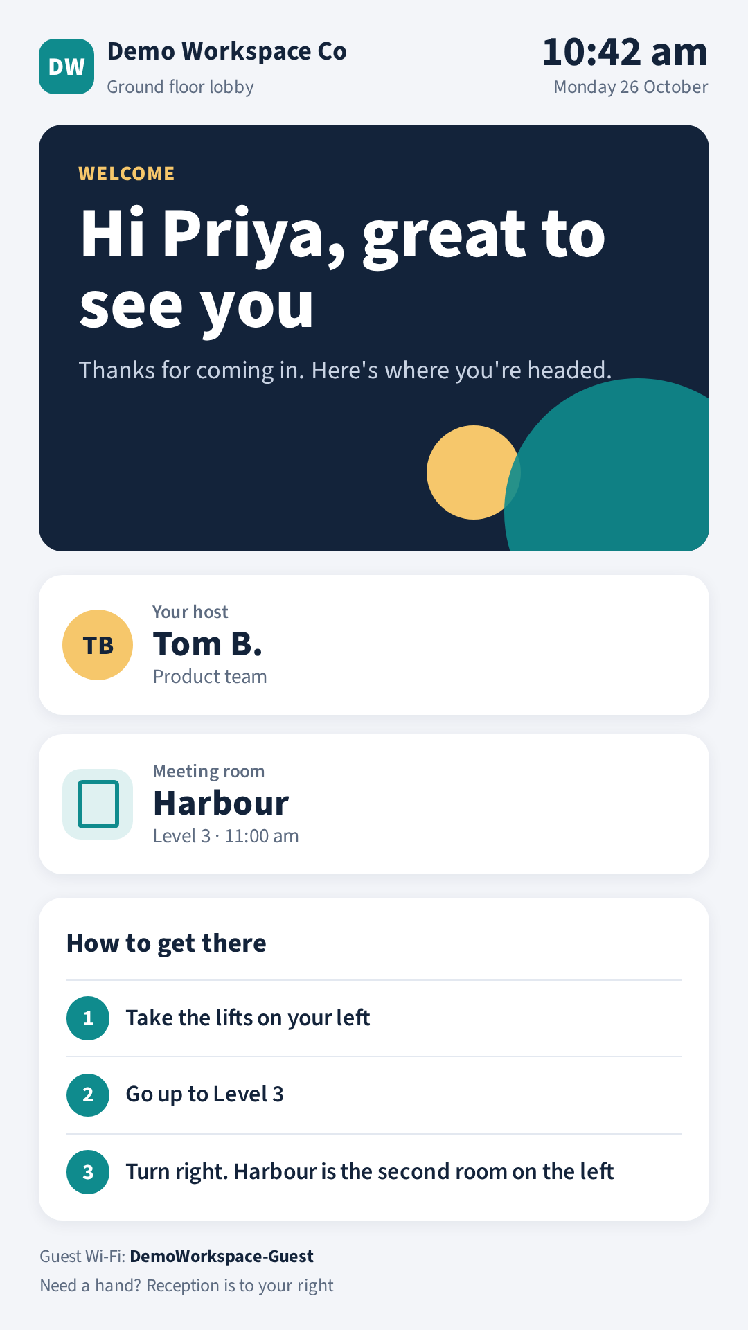The lobby welcome on a portrait screen, greeting a visitor by first name with their host, meeting room and directions